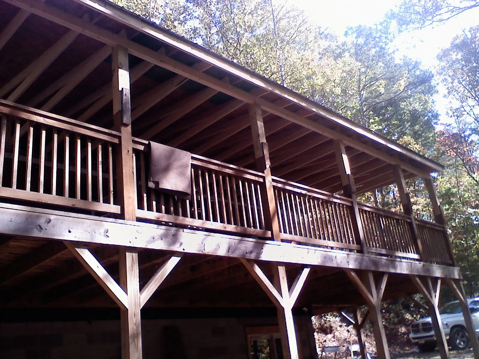 Timber framing under a new elevated porch and deck — Roof Leak Repair in South Jordan by Roofing Brothers